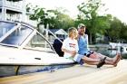 Local surf champ Micha Cantor relaxes with his dad, Stoney Cantor, on the family’s boat in Murrells Inlet.