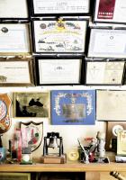 <p>
&nbsp;</p>
<p style="margin: 0.0px 0.0px 0.0px 0.0px; font: 9.0px Adobe Caslon Pro">
<span style="font: 8.0px Avenir"><b>Room of Memories:</b></span><i> General Vaught&rsquo;s home office is an impressive showcase only a three-star general could own, a museum exhibit of plaques and portraits, national awards and certificates, that he has received from around the world.</i></p>
<div>
&nbsp;</div>

