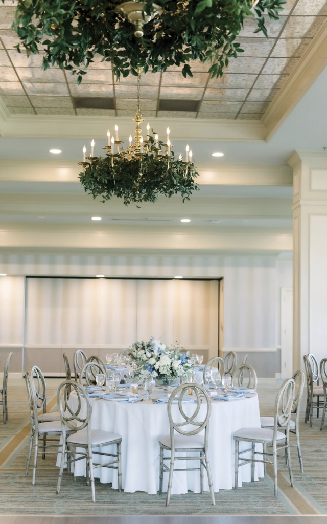 Silver Linings: The Dunes Club served as the  backdrop to the couple&#039;s vision of silver, powder blue, and fresh greenery.