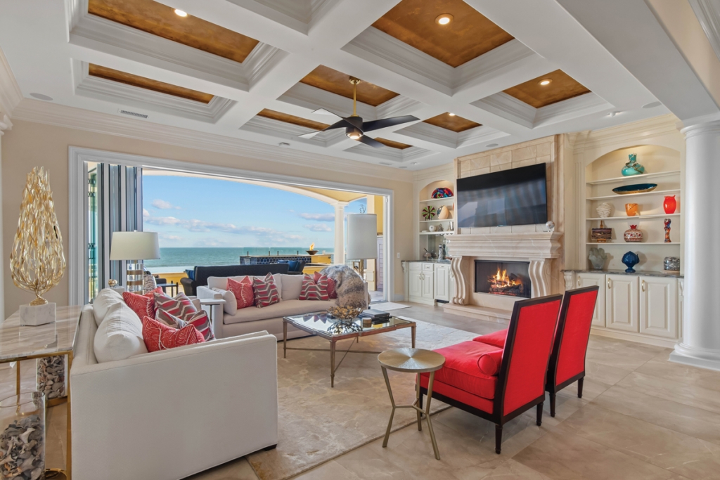 The Campbells love entertaining, and the vibrant colors seen in the living area, kitchen, and outdoor pool/deck space significantly add to the  home’s welcoming ambience. The couple also love their artistically designed wine cellar and beautifully curated glass collection.