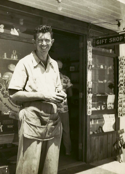 Buz’s father, Justin W. Plyler, stands in front of the Gay Dolphin Gift Cove in 1950.