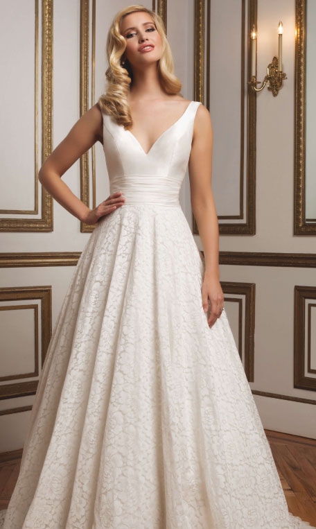 grace Glamour Create an ambiance of 1950s glamour with this silk Dupion V-neckline Justin Alexander  ballgown with fitted bodice, pleated cummerbund and  finished hem lace.  The Little White Dress, $1,533