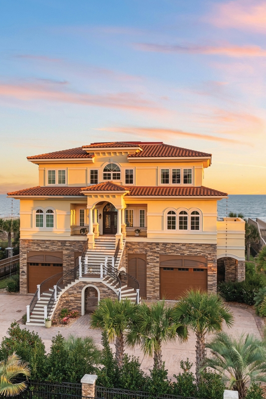 This majestic oceanfront estate in The Dunes Club showcases beautiful craftsmanship with thoughtful, professional design.