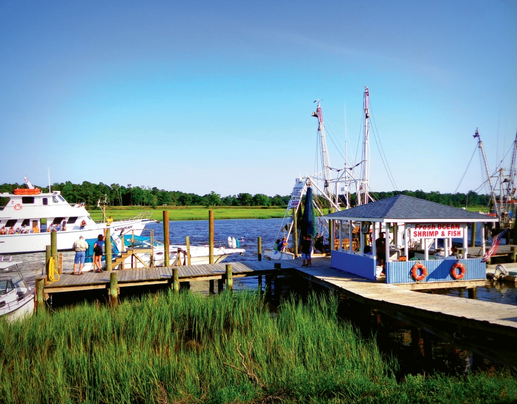 An always-active Calabash waterfront is populated by seafood shacks, bait shops, fishing boats and restaurants.