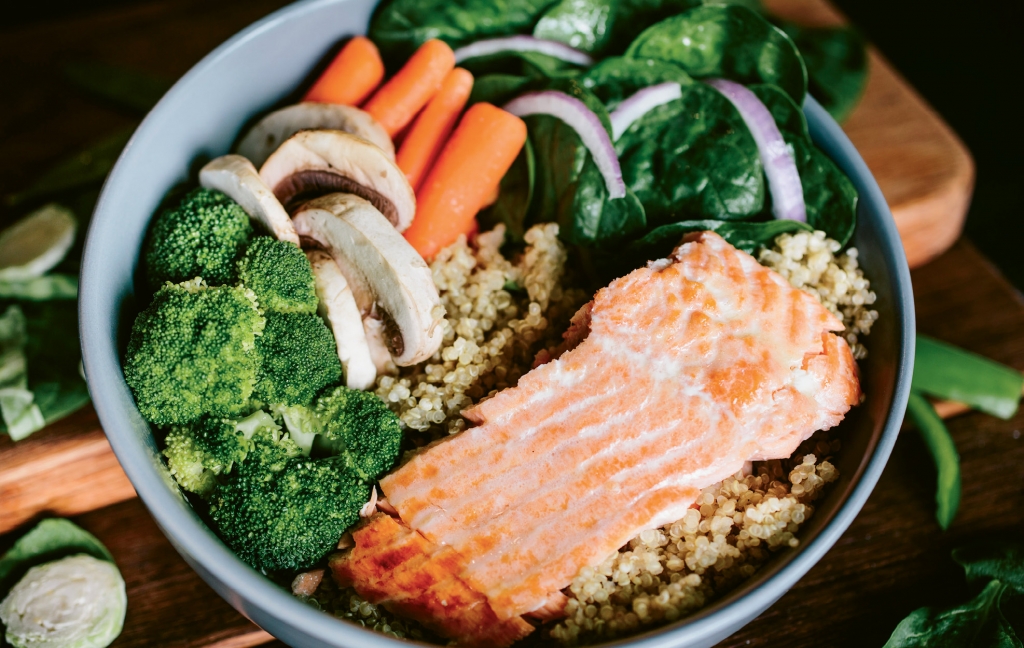 Build your own bowl at Clean Eatz with choices of proteins, vegetables, carbs and sauces.