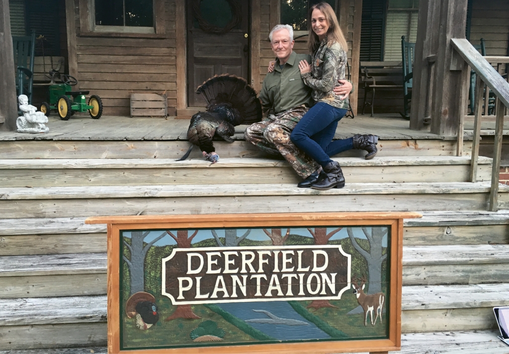 The couple pose after a hunt at Deerfield Plantation in St. George, S.C.