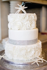 RED VELVET &amp; WHITE RUSSIAN: For Zacquekine Doyle’s wedding to Dwayne Wright, they chose two cake flavors and gray lace piping on the bottom layer to match the dress. Crossants Bistro &amp; Bakery delivered the cake of their dreams.