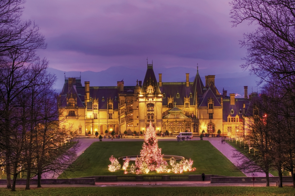 A Warm Glow: Biltmore’s front lawn glows with a 55-foot Norway spruce, lit by approximately 45,000 tiny white lights.