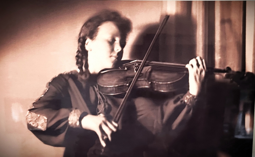 Dean’s mother, Eva Black, pictured at age 13, before escaping Nazi Germany. She is playing her grandfather’s violin and would go on to enjoy a long career as a concert violinist performing throughout the U.S.