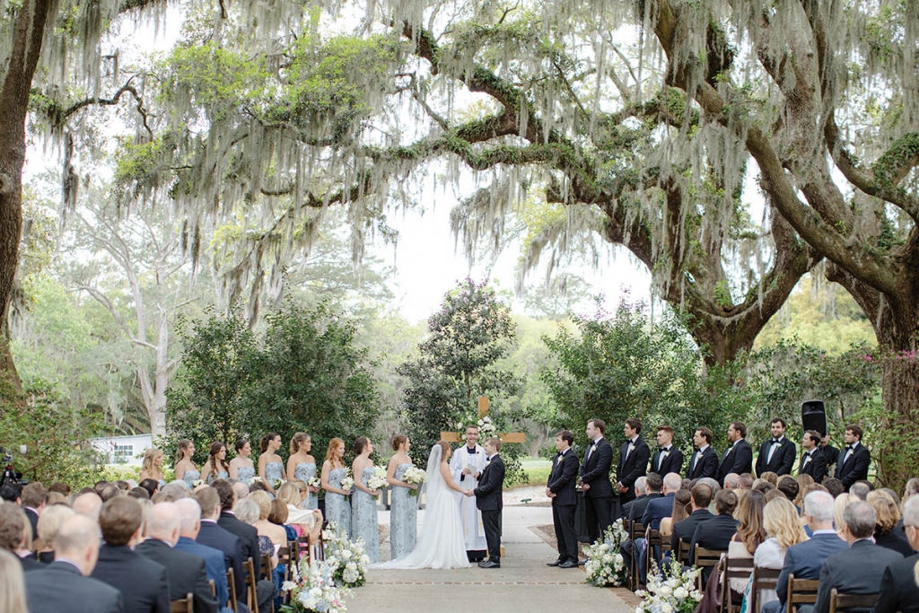 Near and Far:  Olivia and Jay&#039;s happily ever after began down the aisle oceanside, embraced by the warm colors and love from friends and family.