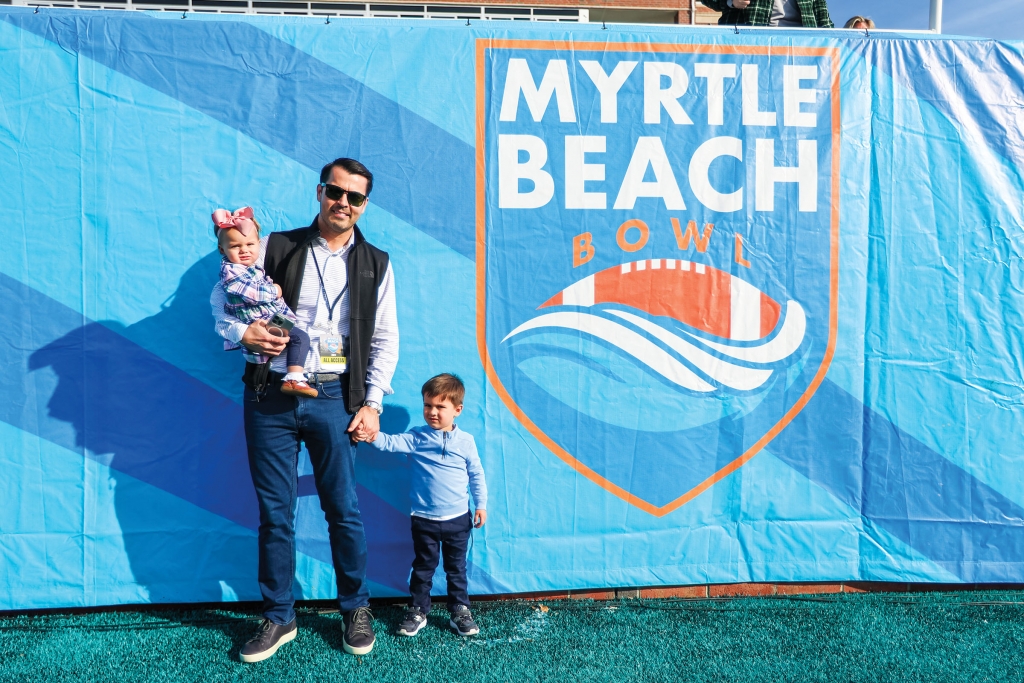 Quigley&#039;s husband, Dan, and her children, Addie Grace and Daniel, at the Myrtle Beach Bowl.