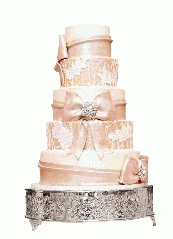 ABOUT THE BOWS: Carrie Tomchik loves bows and wanted it reflected in her wedding to Mark Passaro. Coccadots created this five-tier cake with alternating flavors.