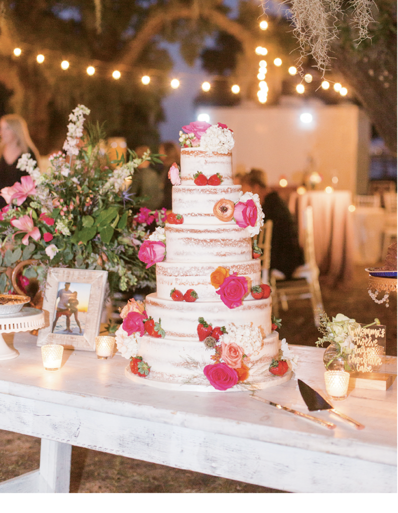 In addition to the beautiful naked cake adorned with flowers and fruit by Incredible Edibles, homemade desserts like pecan pies, Hershey bar pies and 12 layer chocolate cakes were created by the bride’s mother and the couple’s grandmothers