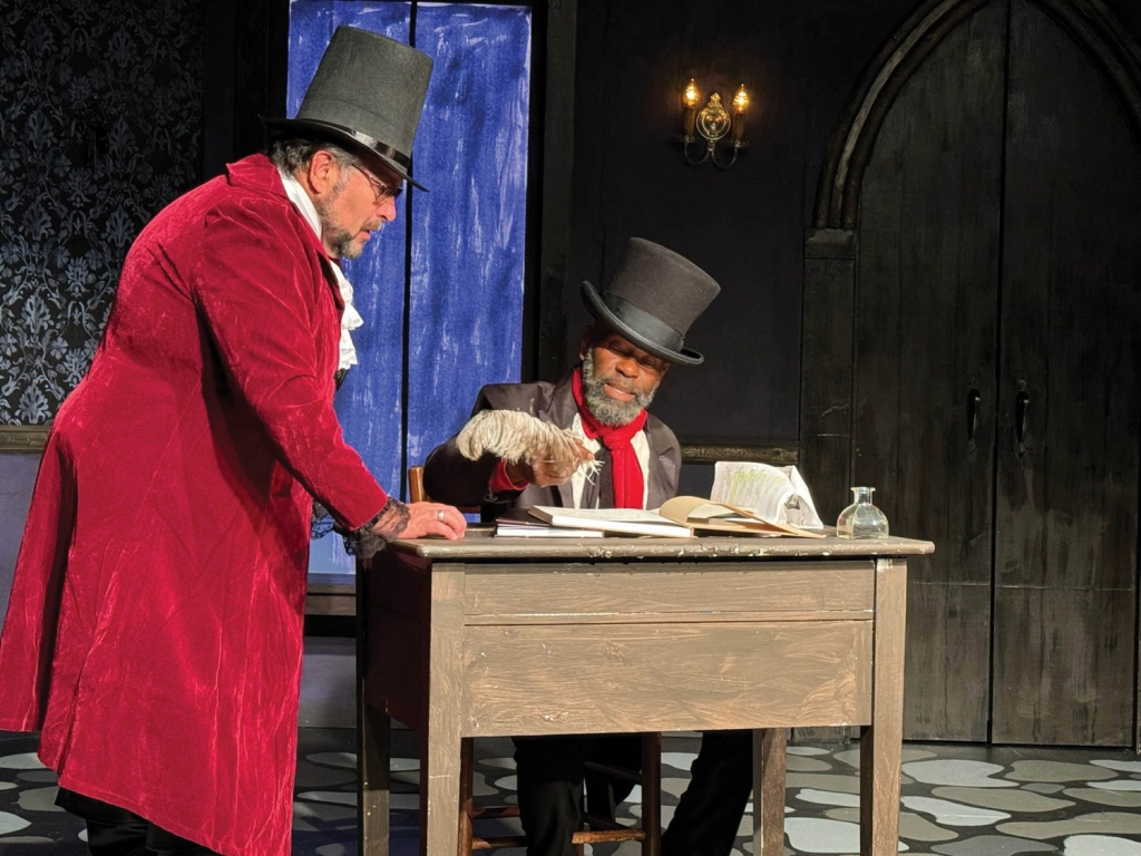 Actors Brian O&#039;Connor (left) and Aikido Burgess (right) perform in a Dream House Theatre production of Charles Dickens&#039; &quot;A Christmas Carol&quot;