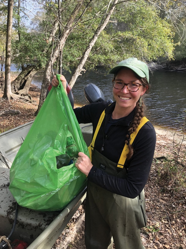 Erin Donmoyer leads a trash cleanup on the Black-Sampit Rivers.