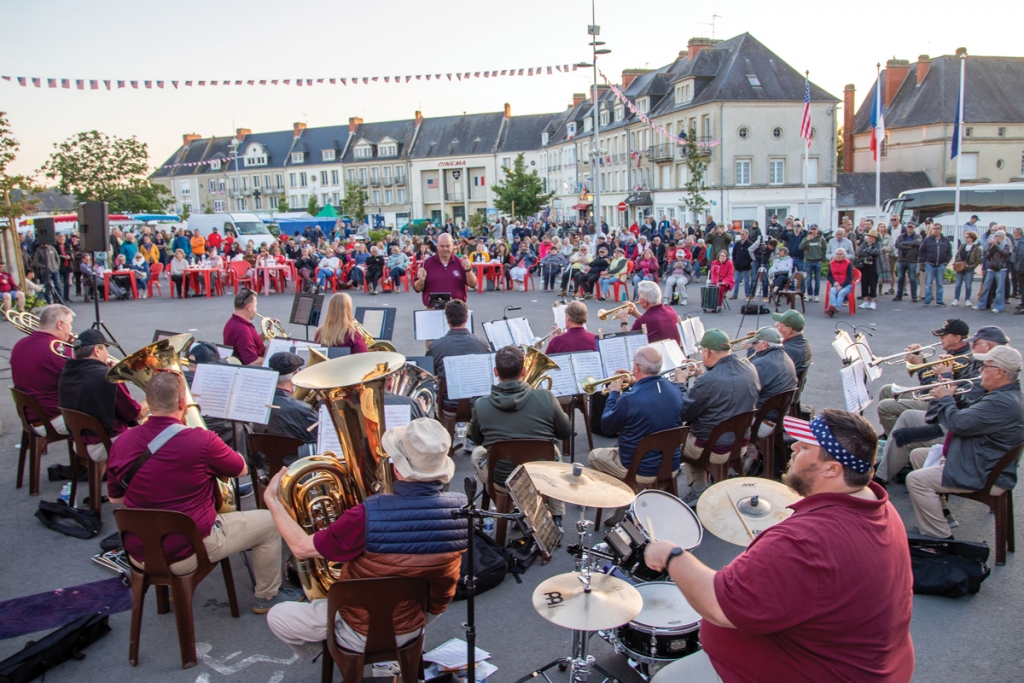 During their trip to Normandy, France, the band performed at several venues near Omaha Beach, to the delight of the local French people.