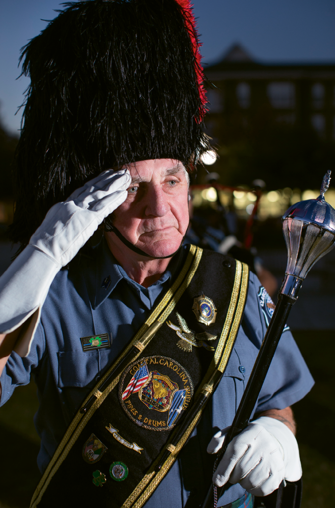 Drum Major Harry Baumann, a retired officer from the Clarkstown, N.Y., police force.