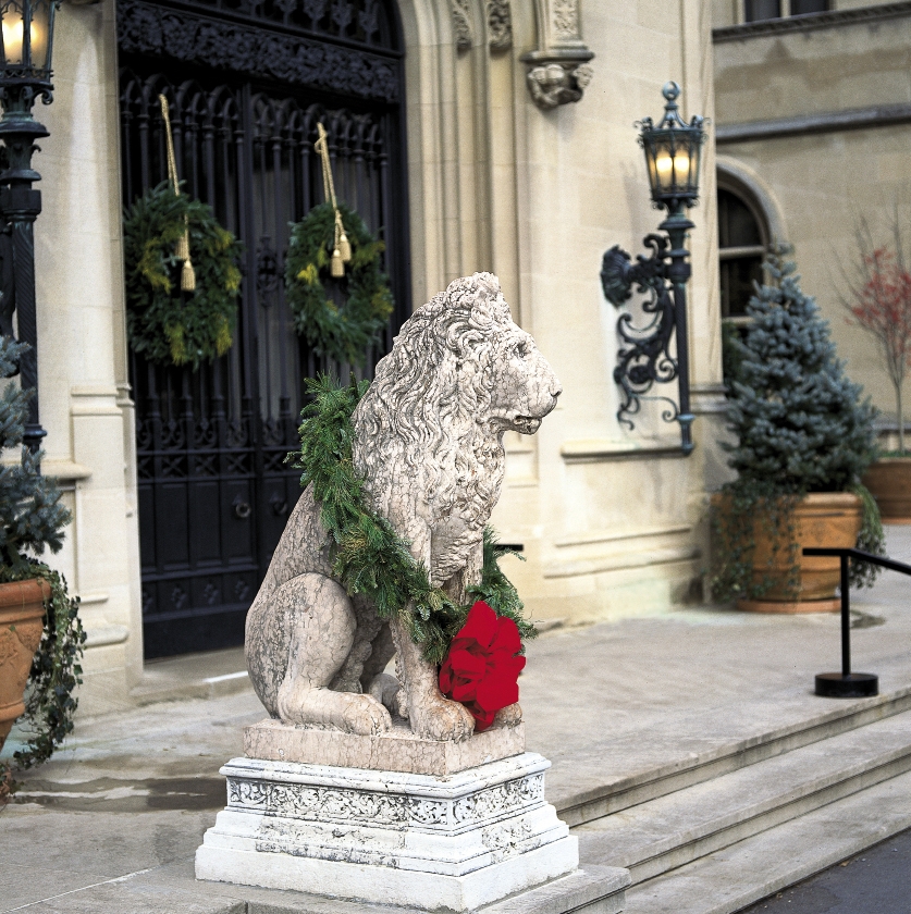 Outside decorations were rare at the turn of the 19th century. The lions flanking the front door of Biltmore House are decked with a bit of greenery, however.