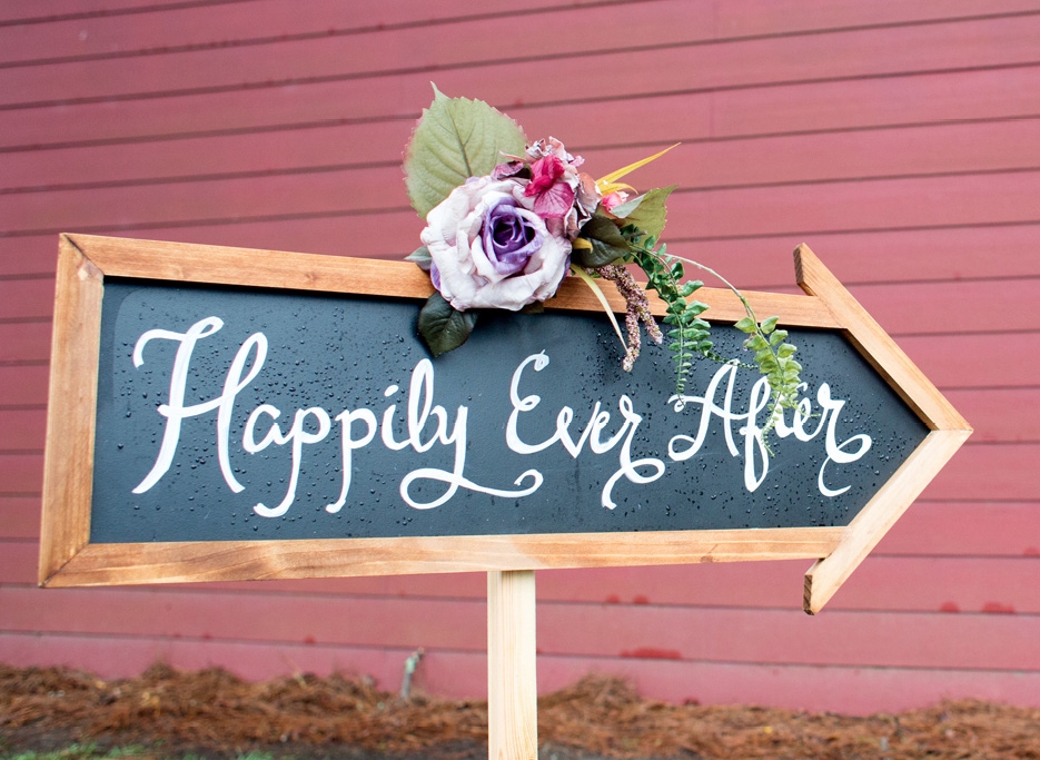 Beautifully handwritten signage was also placed around the reception hall and highlighted the rustic charm of the farm venue.