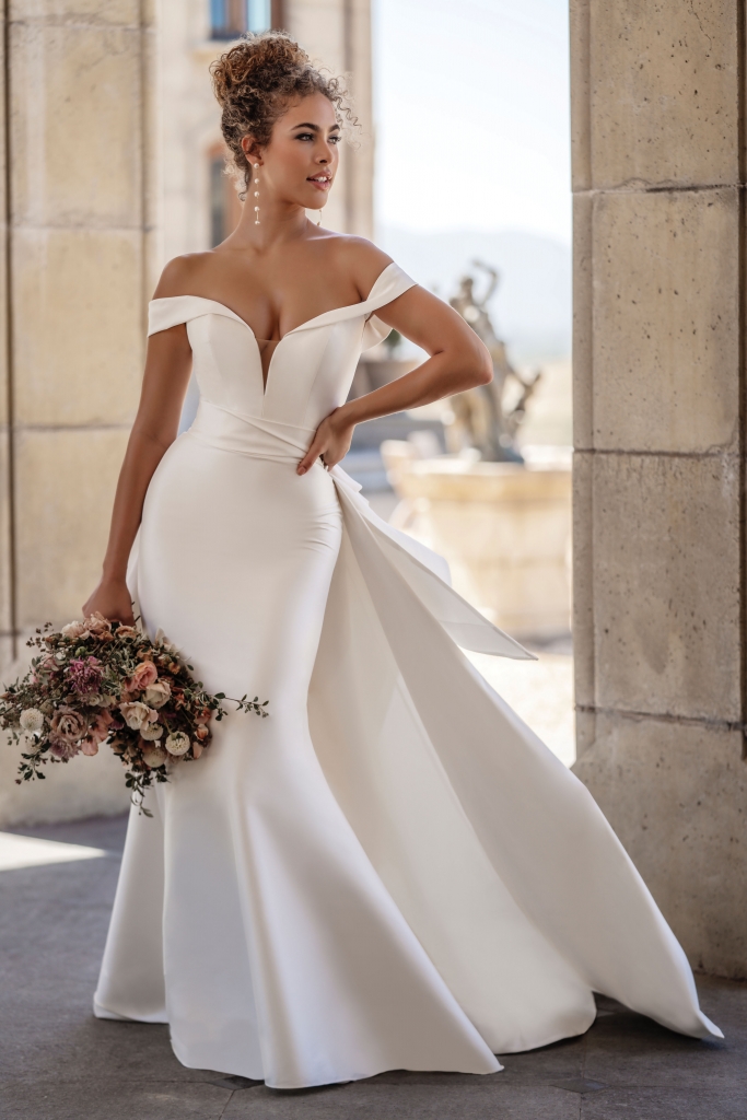 Allure Bridal - This style 1113T gown is statuesque and sparse, and this jaw-dropping stretch Mikado gown features a beautifully sculptural detachable train. Fancy Frocks, $1,59