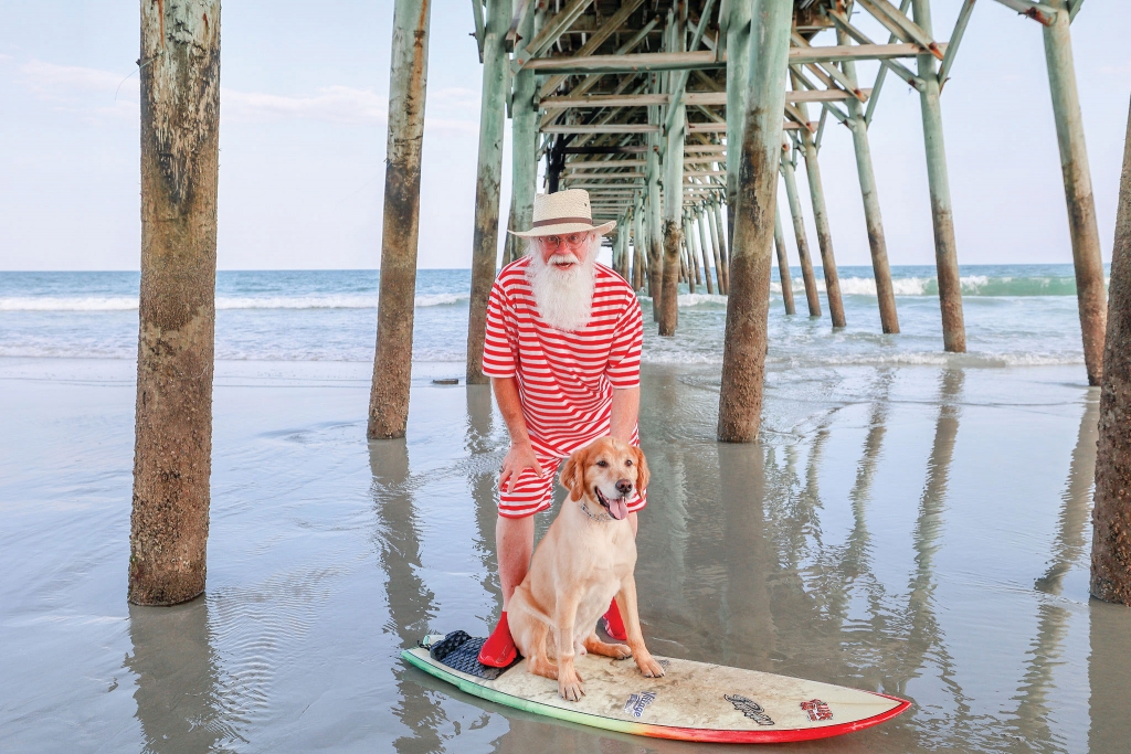 Santa Harry - Summer Santa Harry with friend at the Garden City Pier. At bottom,  On facing page,