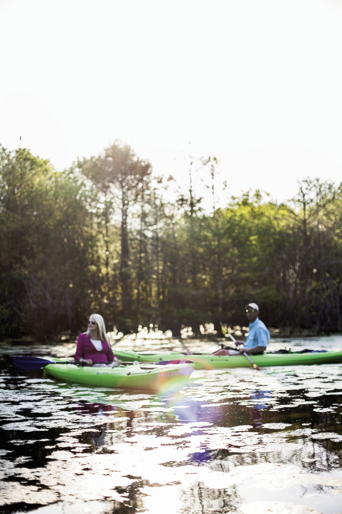 Kayakers sit in awe of the beauty that surrounds them.