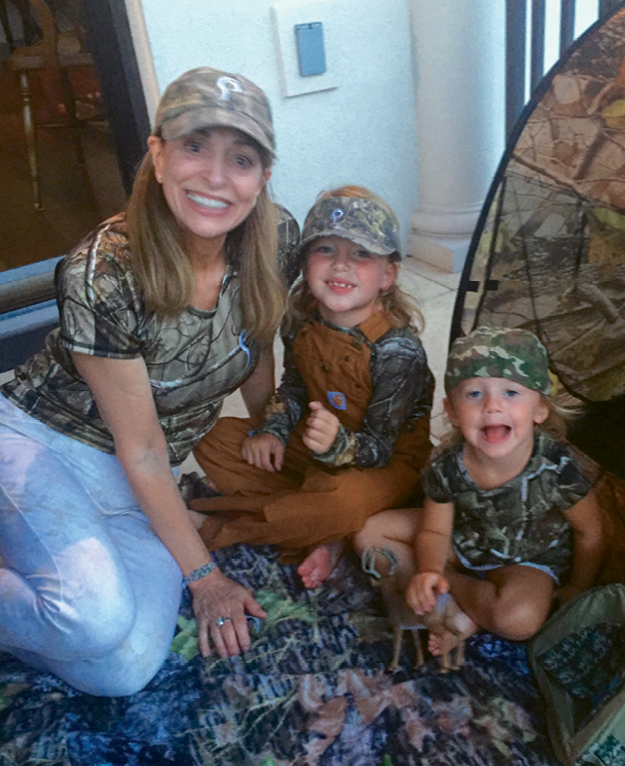 Her granddaughters, Gibbes, 6, and Caroline, 3, also love sporting camo from head to toe.