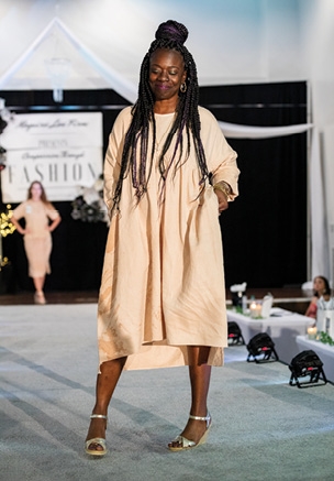 Regina Green modeling “Midnight in Calabash” by Sustainable Business Group, Aliaksandra Zianouka. Winner of Most Wearable.