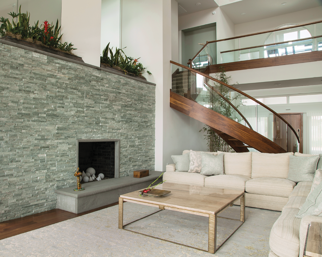 Al &amp; Terri Nardslico, Myrtle Beach - Living Room Showcase: The living room fireplace was redone in stacked stone with a firebox by Napoleon, and live plants with a self-watering misting system line the top.