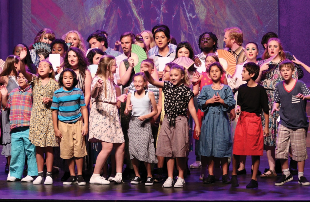 Local kids are given the chance to perform in professional operas, giving them a chance to enjoy the limelight at an early age. Riverside Elementary School music teacher Sara Morey will lead her kids this summer in their performance during the opera Street Scene.