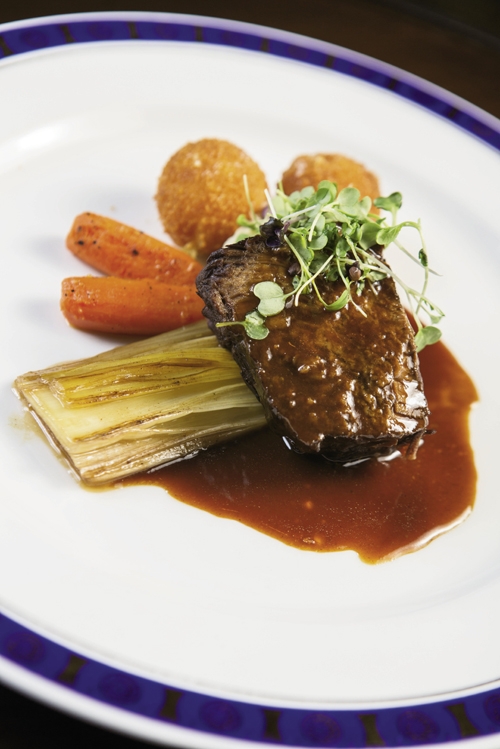 Seventh Course Up!: The meat course prepared by chef Mike McKinnon: Zinfandel-braised short ribs with a parsnip puree, caramelized leeks, roasted carrots and truffle potatoes.
