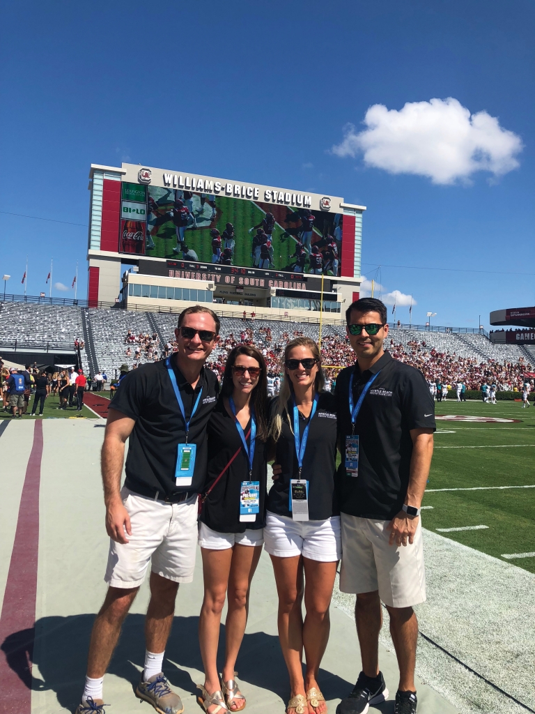 Rachel (second from right) pictured at University of South Carolina’s Williams-Brice Stadium during a game sponsored by Visit Myrtle Beach.