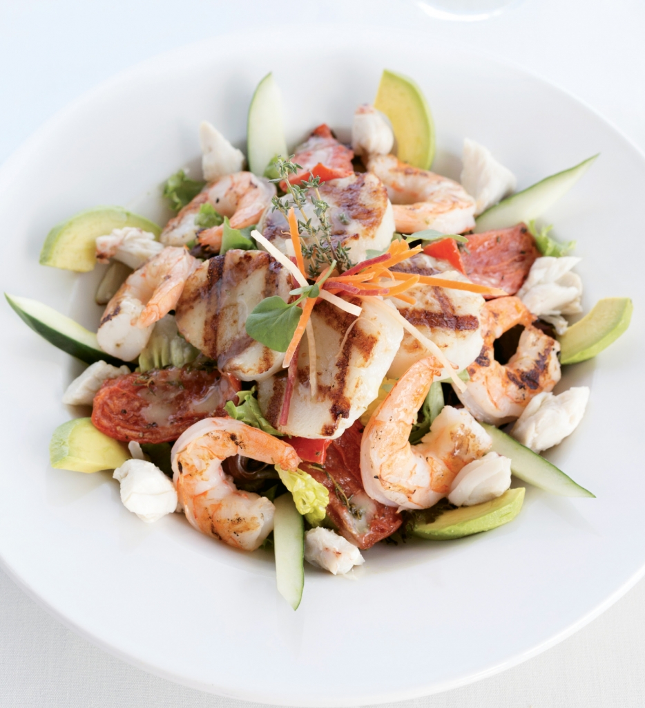 Green Plate Special: The Grilled Seafood Salad at Austin’s is a toss up of shrimp, scallops and crab served over baby greens with fresh avocado and roasted tomatoes. A lemon herb vinaigrette dresses the dish perfectly.