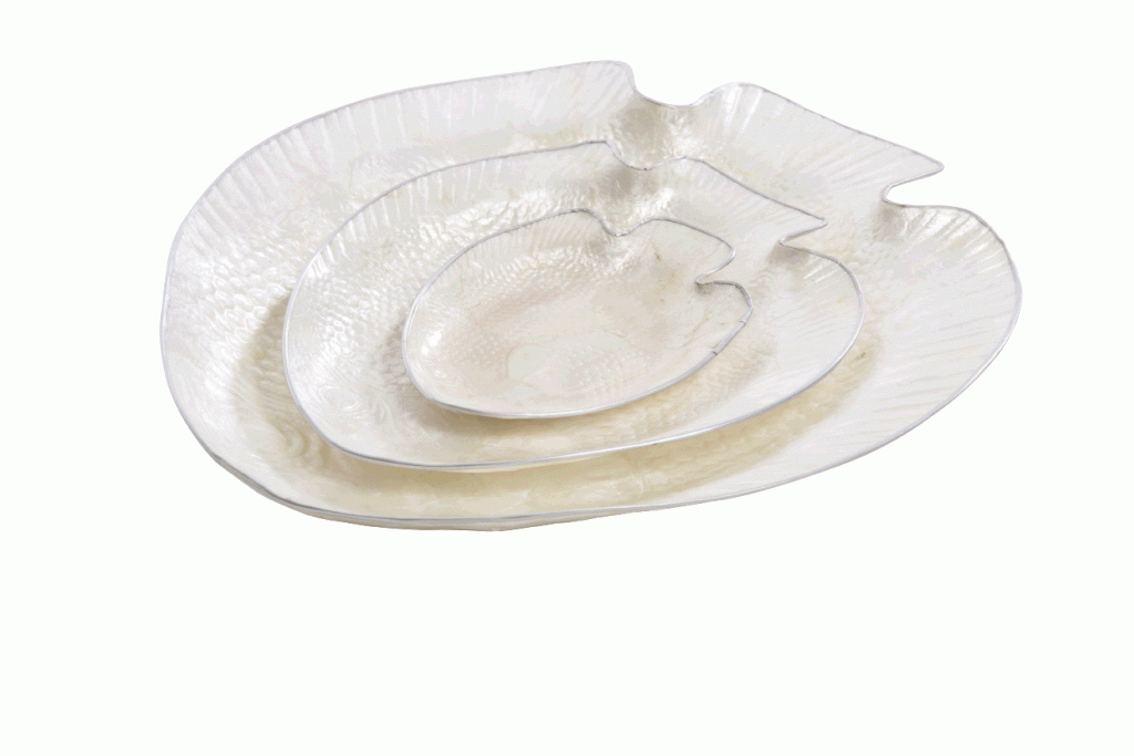 Three’s Company  Chips and dips seem like a great option on these iridescent pearl-hued fish trays.   $49. As For Me and My House, 11382 Ocean Highway #2,  Pawleys Island. (843) 235-6525