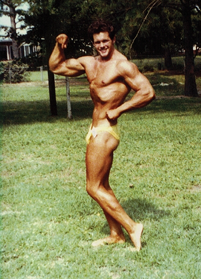 Dalton posing in his past as a bodybuilder.