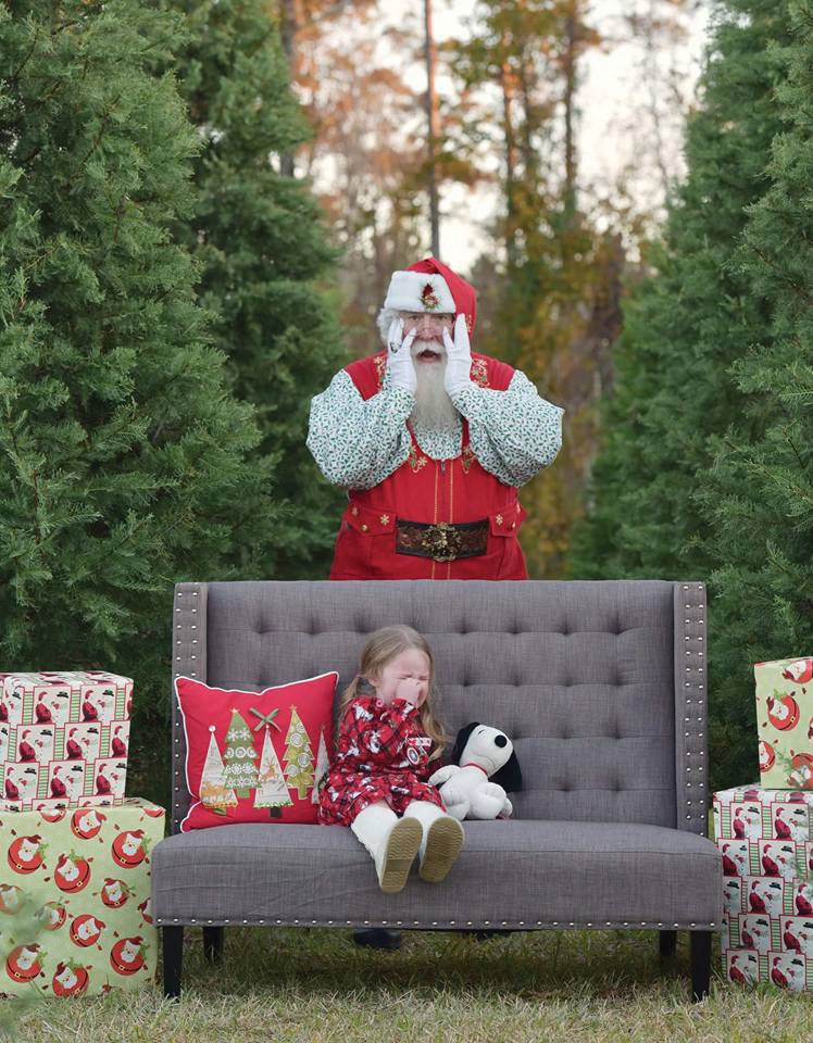 Santa John with granddaughter Lilly at a photo shoot.