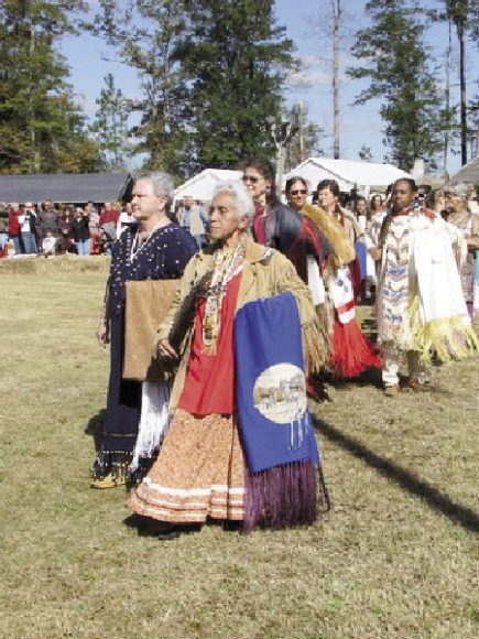 Colorful and unique regalia is on display when the Indian women are honored in the Sacred Circle.