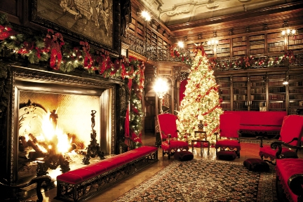 Cozy Christmas: The glow of hundreds of lights and a roaring fire illuminate George Vanderbilt’s Library during Christmas at Biltmore.