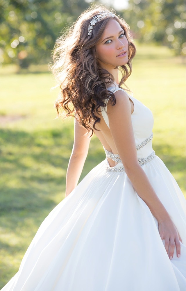 Madison James by Allure - This ball gown features small cap sleeves and a double-beaded waist with a beautiful twist of beads and low back. And it has pockets! Fancy Frocks; $1,298