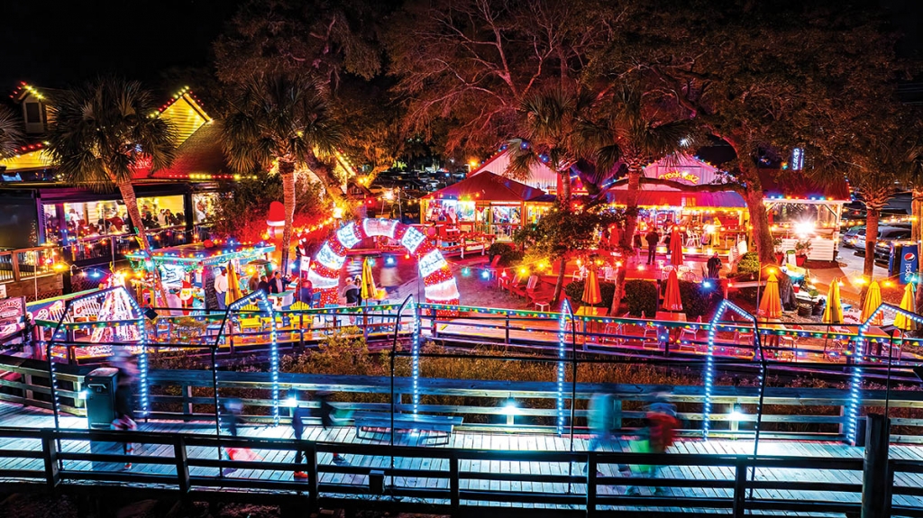 The MarshWalk Wonderland of Lights in Murrells Inlet is a walk-through event featuring thousands of lights paired with arches synced to Christmas music along the half-mile boardwalk.