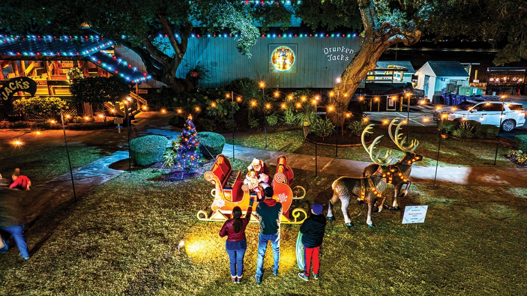 Guests enjoy a visit with Santa outside Drunken Jack’s Restaurant &amp; Lounge.