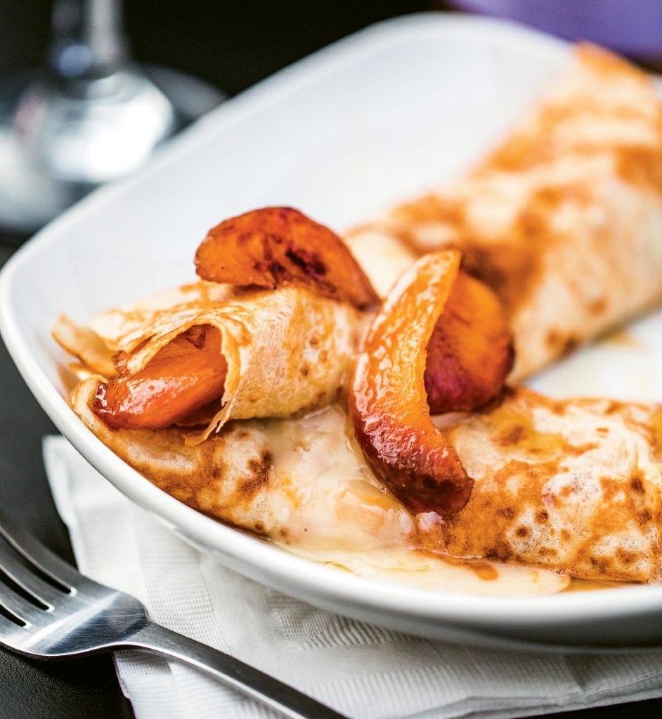 Pluck A Peach: Pairing caramelized peaches with creamy warm Brie and finishing with a drizzle of honey makes for a light and dreamy crepe.