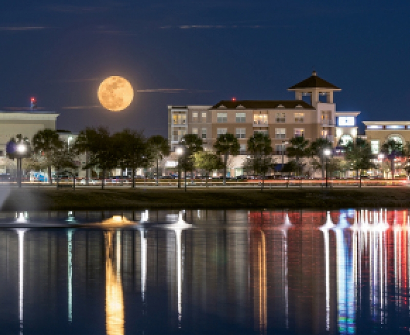 SUPER MOON OVER MARKET COMMON: Chuck Lawhon submitted this photo in our Images of the Grand Strand photo contest. We loved it so much, we used it with this article