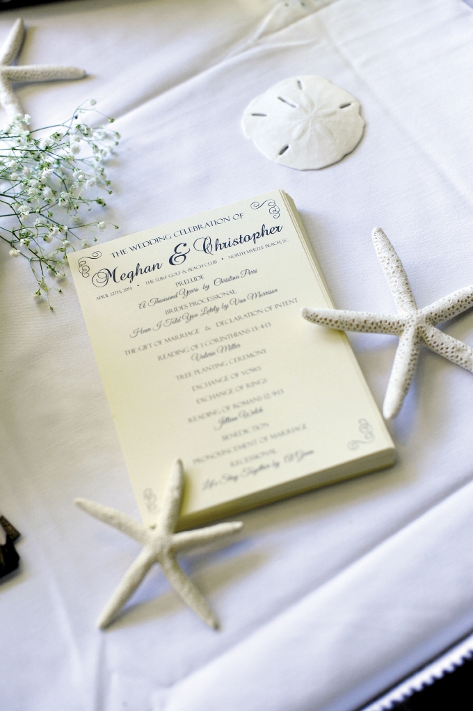 Little details were noted in placement of wedding gifts and cards, sparklers during the couple’s exit and the printed materials for the wedding.