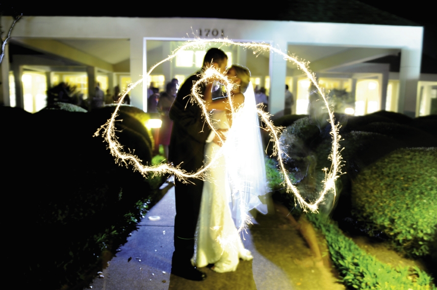 Little details were noted in placement of wedding gifts and cards, sparklers during the couple’s exit and the printed materials for the wedding.