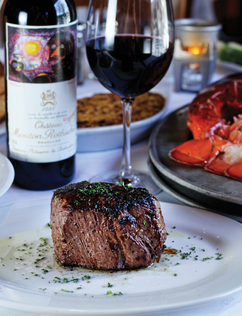 All of the steaks served at New York Prime are aged 28 days and prepared “Pittsburgh style” with a charred exterior.