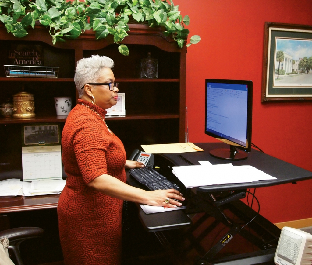 At her desk in her chambers, Judge Wilson answers the day’s emails.