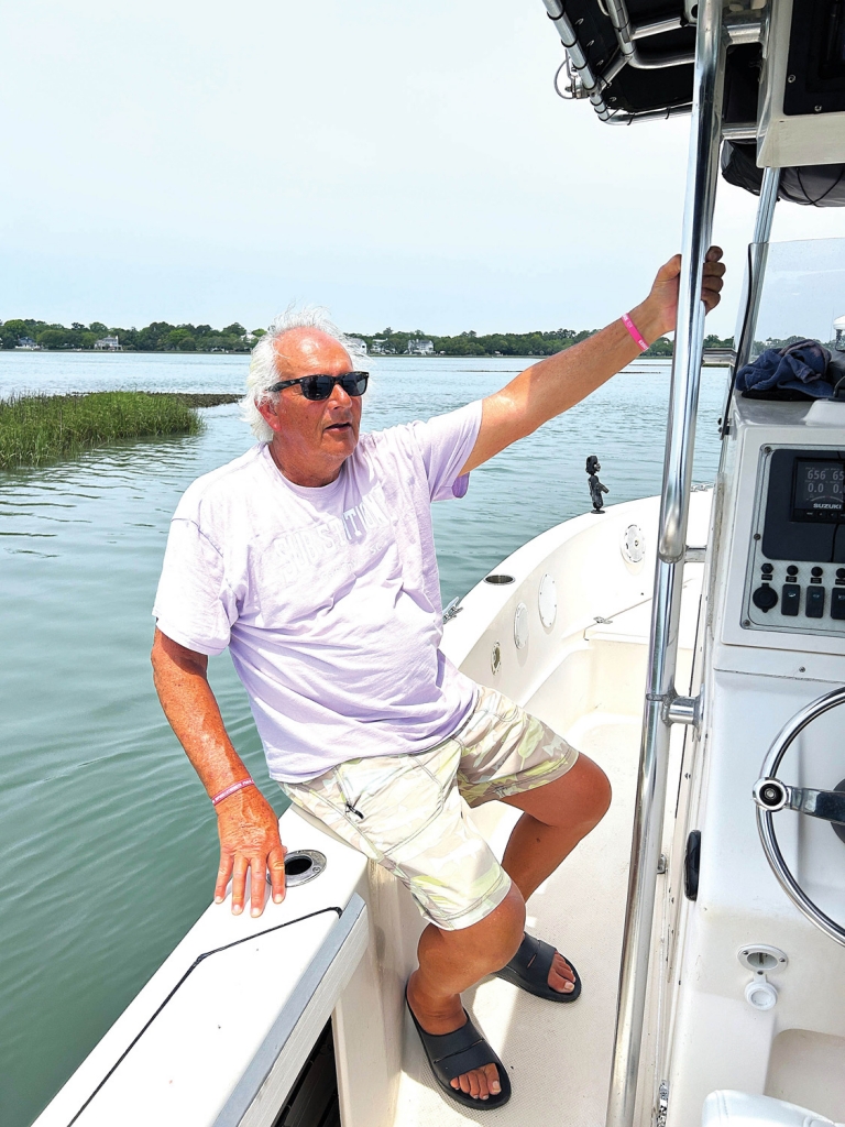 1:23pm: Customer Lewis Huskey hangs on as the boat moves to a hopefully more productive location.