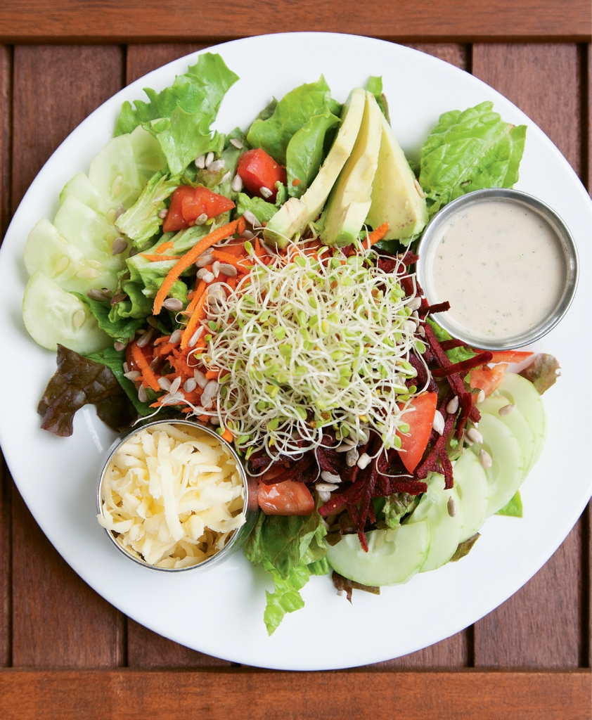 Bay Naturals has several salads on the menu, including the Bay Chef Salad with organic mixed lettuces, organic carrots, tomatoes, clover sprouts, avocado and more.
