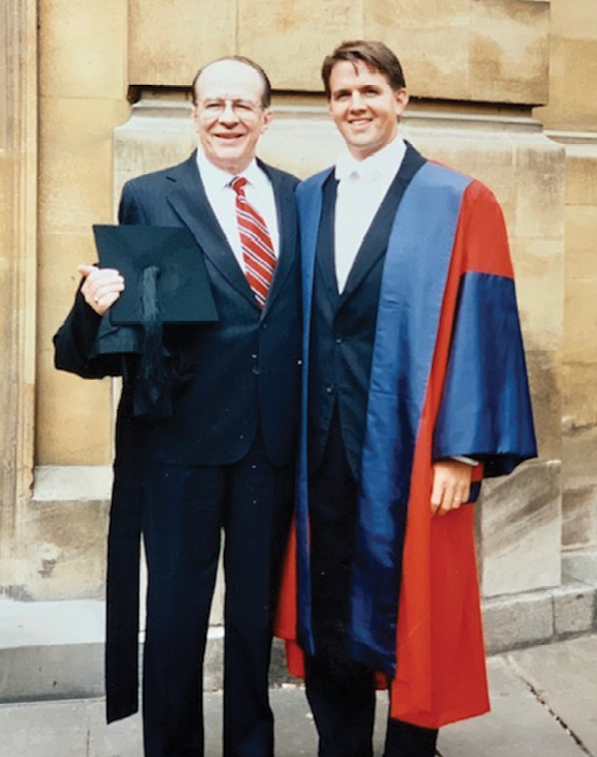 At his graduation from the University of Oxford in 1995, Benson with his father, the late Mark Benson.